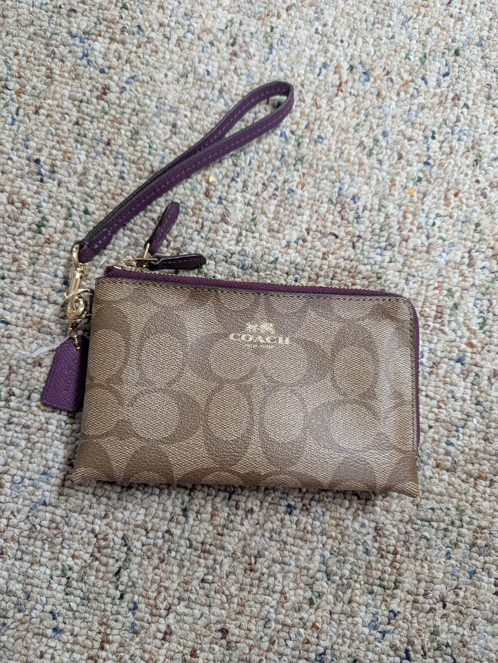 Coach Brown Signature Canvas Wristlet with Plum Accents